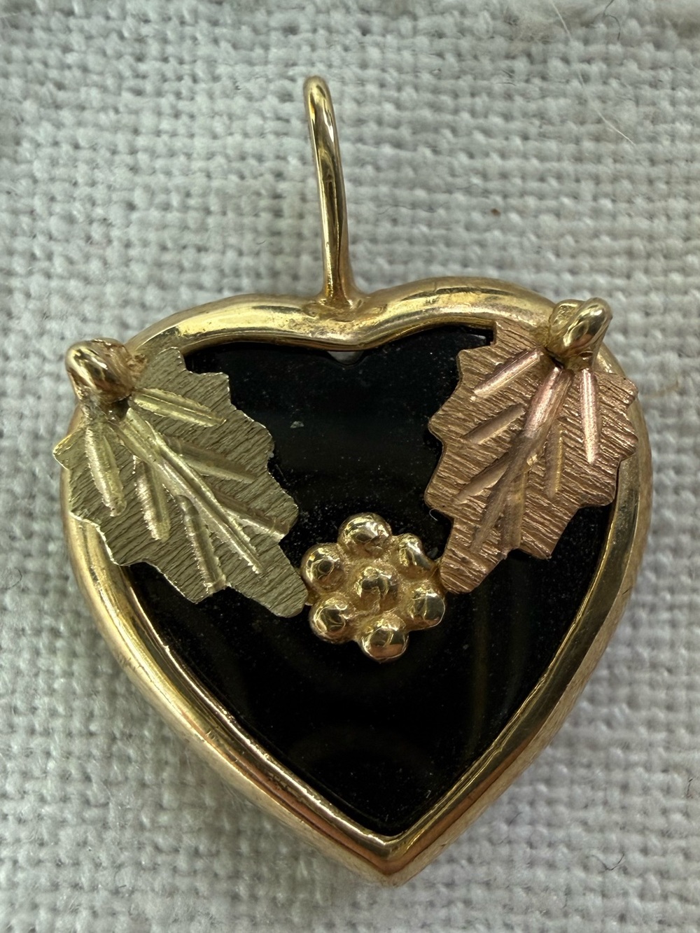 Riddle's Black Hills Gold Onyx Heart Pendant